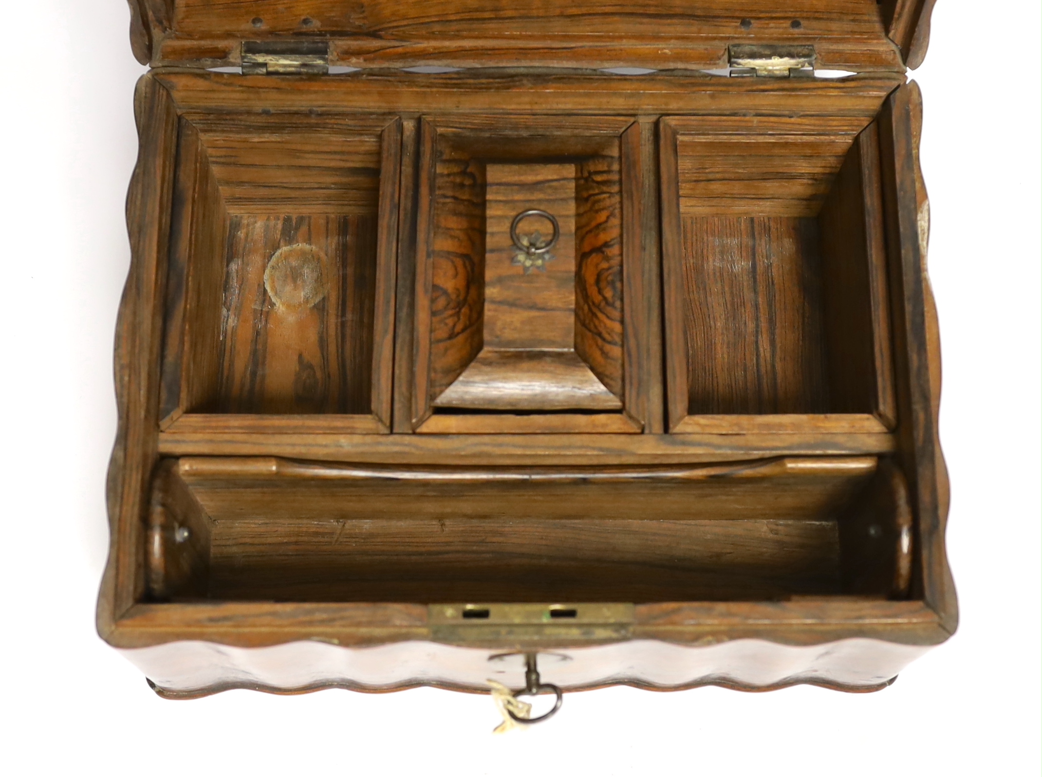 A Ceylonese calamander tea caddy, c.1820, with four internal compartments and key, 29cm wide